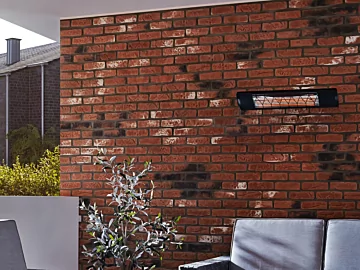 Heatscope Heaters Next 3000W Radiant Heater detail reveals white aluminium slimline electric infrared wall-mounted patio heater.