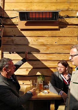 Heatscope Heaters Spot 2800W Radiant Heater warms the hospitality restaurant terrace at Commercial Space with wall-mounted electric patio heating.