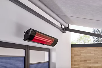 Heatscope Heaters Pure 3000W Radiant Heater wall-mounted outdoors, warming the Modern Garden Design patio with infrared heat.
