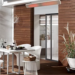 Heatscope Heaters Vision 3200W Radiant Heater wall-mounted on a private residence patio, outdoor electric infrared warmth.